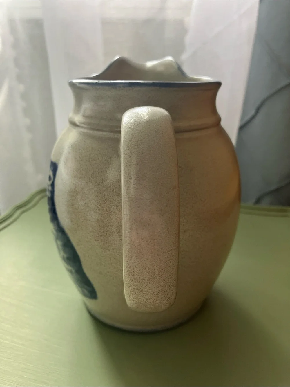 Stoneware type 6” pitcher with blue cat design